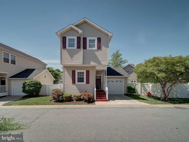 7317 Jubilee Cir, Elkridge, MD 21075 - traditional-style home with an attached garage and concrete driveway