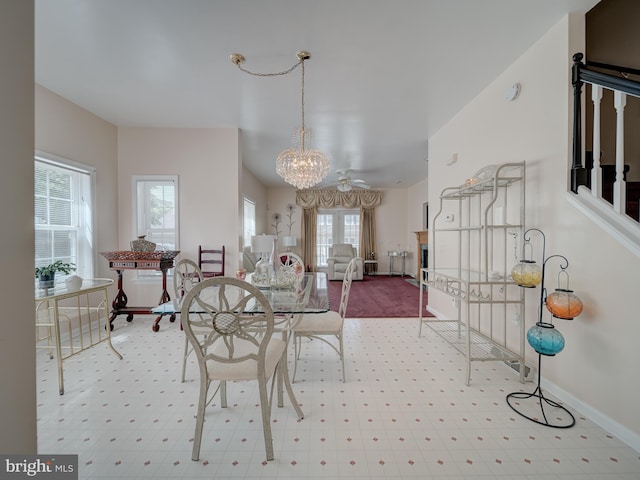 7317 Jubilee Cir, Elkridge, MD 21075 - dining room with healthy amount of natural light, a chandelier, and ceiling fan