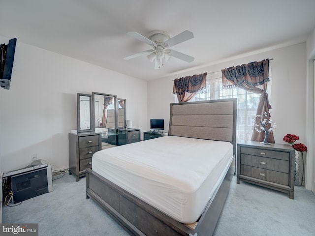 7317 Jubilee Cir, Elkridge, MD 21075 - bedroom with light colored carpet and ceiling fan