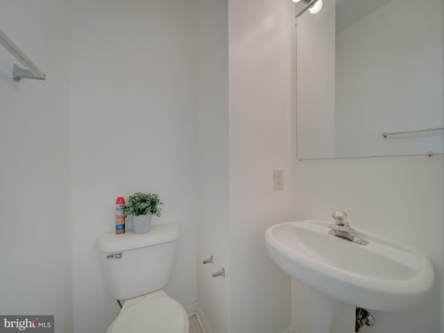 7317 Jubilee Cir, Elkridge, MD 21075 - half bathroom with toilet and a sink