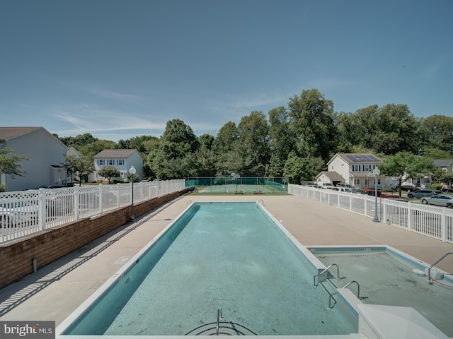 7317 Jubilee Cir, Elkridge, MD 21075 - community pool featuring a patio area and a residential view