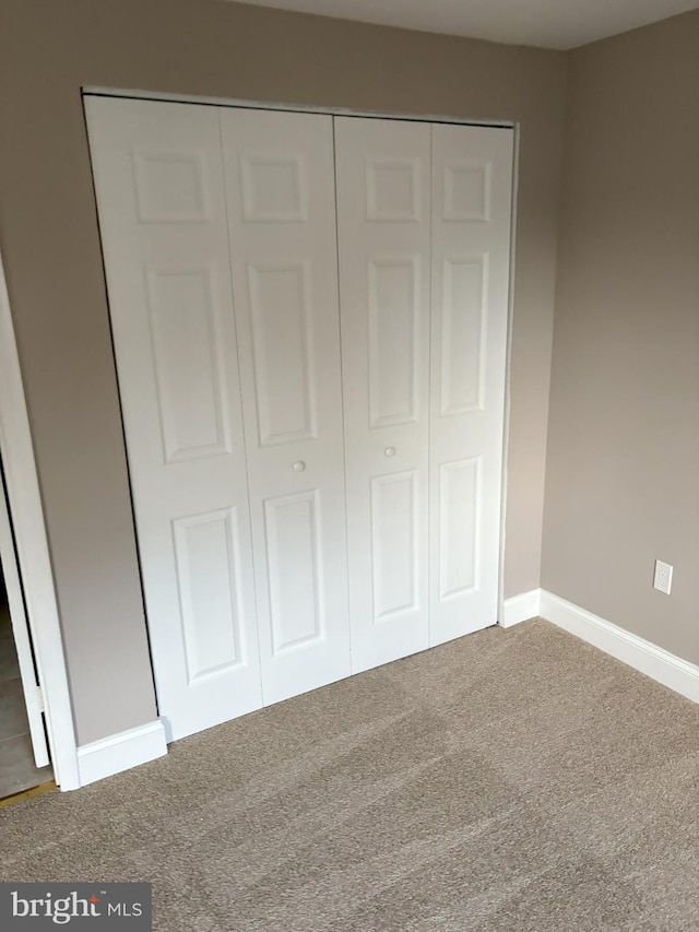 1708 Granite Ct, Crofton, MD 21114 - unfurnished bedroom with carpet flooring and a closet
