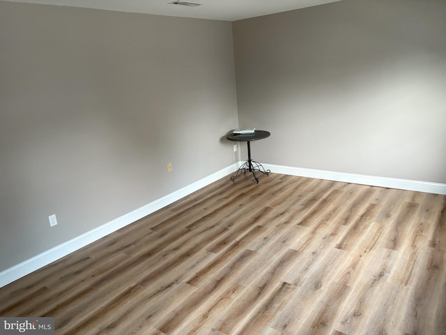 1708 Granite Ct, Crofton, MD 21114 - spare room featuring baseboards and wood finished floors