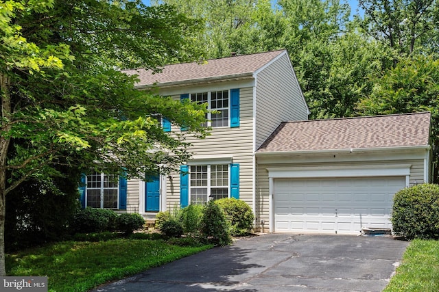 14908 Slippery Elm Ct, Woodbridge, VA 22193 - view of front of property with asphalt driveway, an attached garage, and a shingled roof