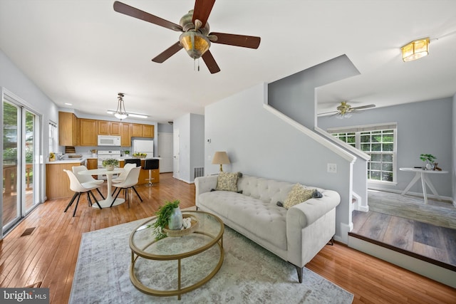 14908 Slippery Elm Ct, Woodbridge, VA 22193 - living area featuring ceiling fan and light wood-style floors