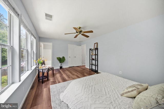 14908 Slippery Elm Ct, Woodbridge, VA 22193 - bedroom with dark wood-style flooring and a ceiling fan