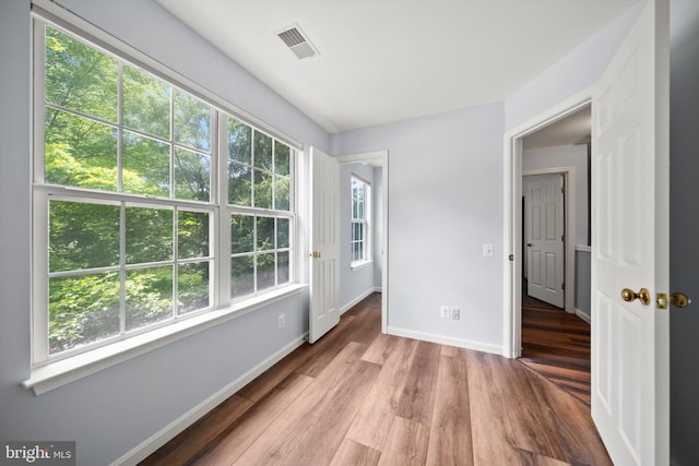 14908 Slippery Elm Ct, Woodbridge, VA 22193 - unfurnished room featuring wood finished floors and baseboards