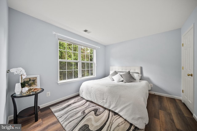 14908 Slippery Elm Ct, Woodbridge, VA 22193 - bedroom with baseboards and wood finished floors