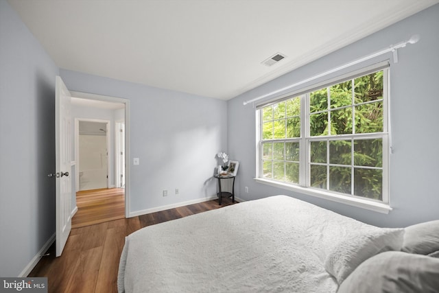 14908 Slippery Elm Ct, Woodbridge, VA 22193 - bedroom featuring multiple windows and wood finished floors