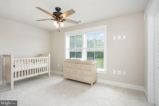1311 Corbett Rd, Monkton, MD 21111 - carpeted bedroom with a crib and ceiling fan