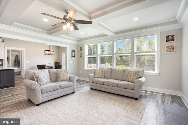 1311 Corbett Rd, Monkton, MD 21111 - living area with coffered ceiling, crown molding, wood finished floors, beamed ceiling, and ceiling fan