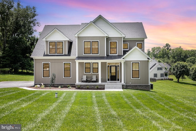 1311 Corbett Rd, Monkton, MD 21111 - modern inspired farmhouse with a porch, a front yard, and a shingled roof
