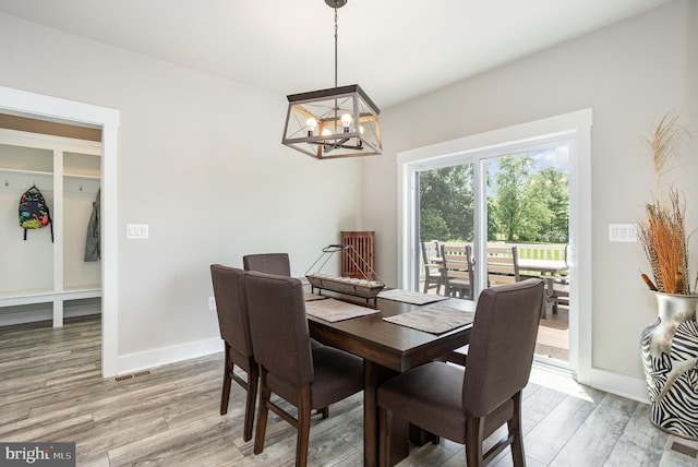 1311 Corbett Rd, Monkton, MD 21111 - dining room with a chandelier and light wood-type flooring