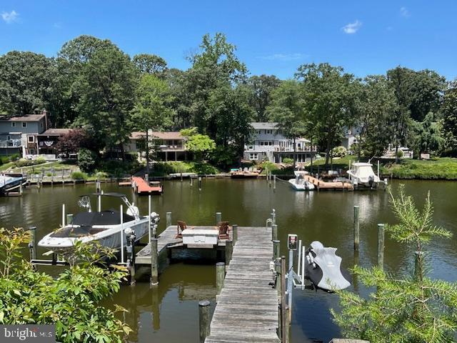 34 Chartham Ln, Severna Park, MD 21146 - dock area with a water view and view of scattered trees