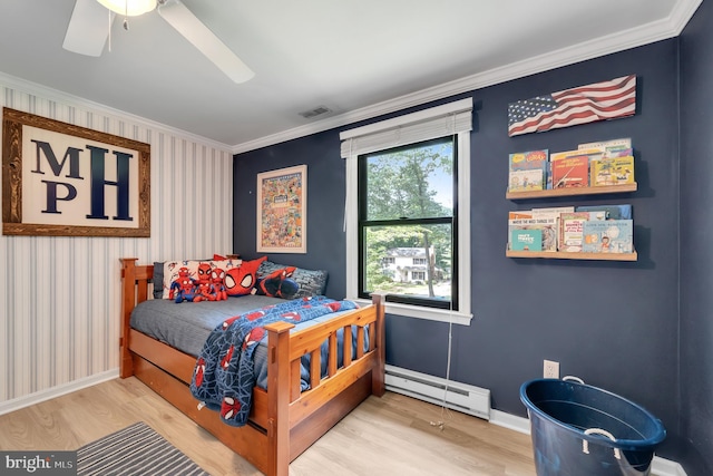 2333 Sunset Cir, Glenville, PA 17329 - bedroom with baseboard heating, wood finished floors, crown molding, a ceiling fan, and wallpapered walls
