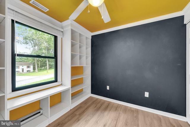 2333 Sunset Cir, Glenville, PA 17329 - spare room featuring a ceiling fan, ornamental molding, and wood finished floors