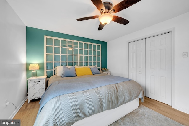 2333 Sunset Cir, Glenville, PA 17329 - bedroom with wood finished floors, a closet, and a ceiling fan
