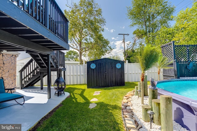 7723 Meath Rd, Baltimore, MD 21222 - fenced backyard with stairway, a shed, and a patio area