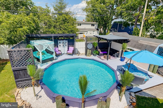 7723 Meath Rd, Baltimore, MD 21222 - view of pool with a deck, a fenced backyard, and an outdoor living space