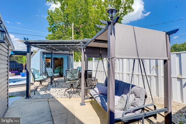 7723 Meath Rd, Baltimore, MD 21222 - fenced backyard with a pergola, a patio, and outdoor dining space