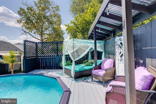 7723 Meath Rd, Baltimore, MD 21222 - outdoor pool featuring a deck and a fenced backyard