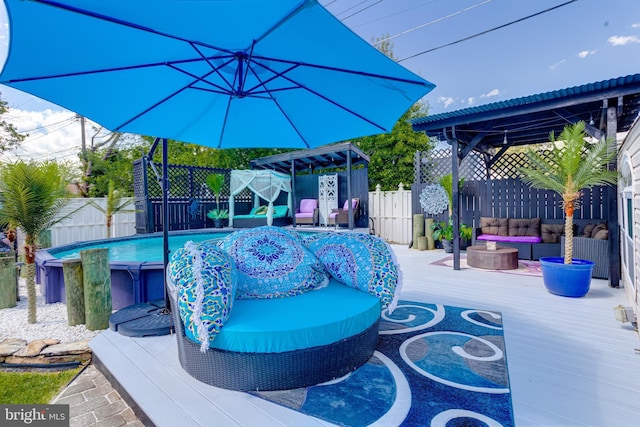 7723 Meath Rd, Baltimore, MD 21222 - view of pool featuring an outdoor hangout area, a deck, and a fenced backyard