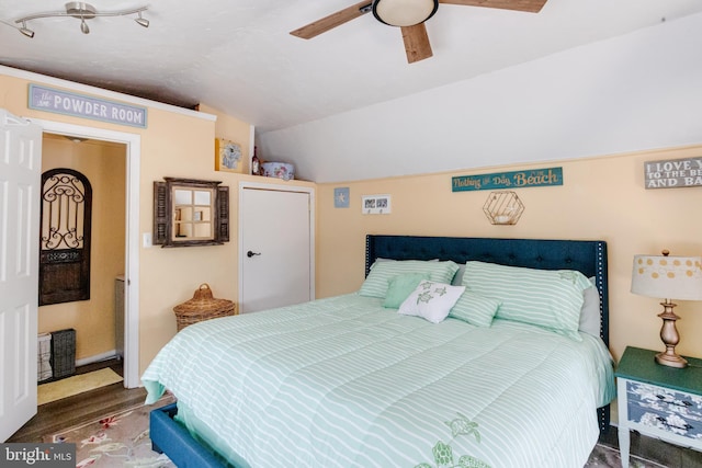 7723 Meath Rd, Baltimore, MD 21222 - bedroom with vaulted ceiling, ceiling fan, and wood finished floors