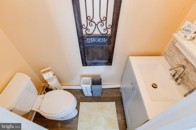 7723 Meath Rd, Baltimore, MD 21222 - half bath featuring vanity and decorative backsplash