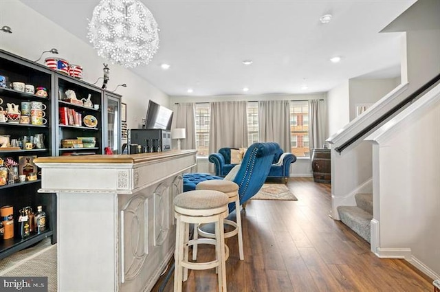 2041 Ruby Turn, Bowie, MD 20721 - bar area featuring wood finished floors, stairway, recessed lighting, and a chandelier
