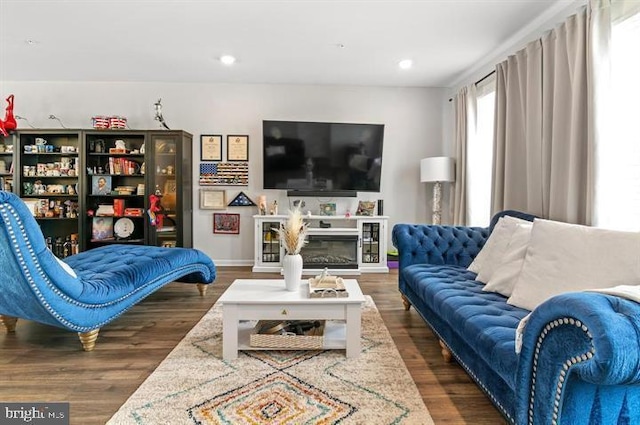 2041 Ruby Turn, Bowie, MD 20721 - living room with dark wood-style flooring, a glass covered fireplace, and recessed lighting