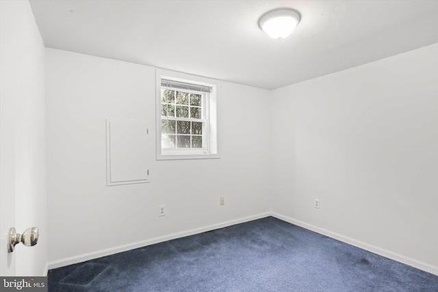7131 Murray Ln, Annandale, VA 22003 - unfurnished room with dark carpet and baseboards