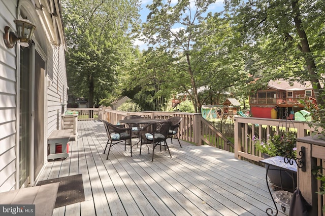7131 Murray Ln, Annandale, VA 22003 - deck with outdoor dining area and a playground