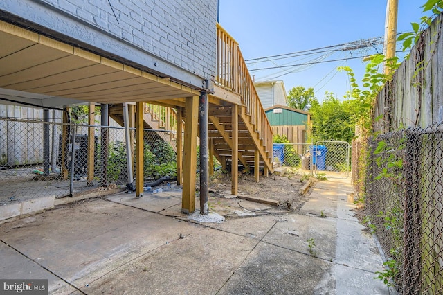 2710 The Alameda, Baltimore, MD 21218 - fenced backyard featuring stairway and a patio