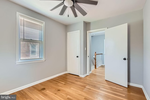 3401 Woodring Ave, Baltimore, MD 21234 - unfurnished bedroom with light wood-type flooring and ceiling fan