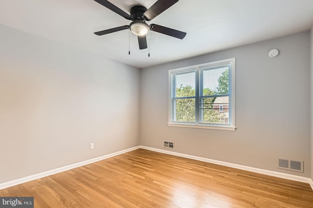 3401 Woodring Ave, Baltimore, MD 21234 - unfurnished room featuring light wood-type flooring, a smoke detector, and ceiling fan