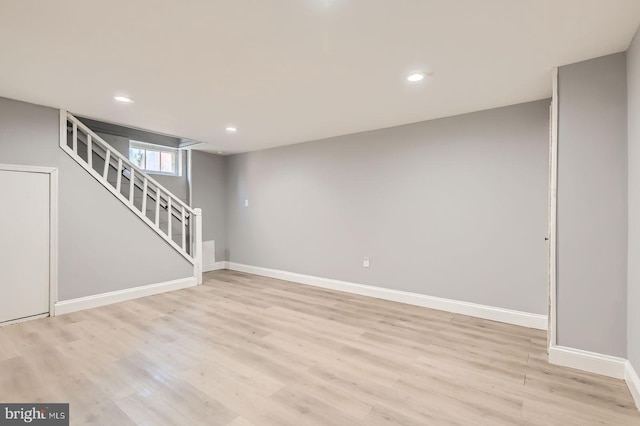 3401 Woodring Ave, Baltimore, MD 21234 - basement featuring light wood-type flooring, stairway, and recessed lighting