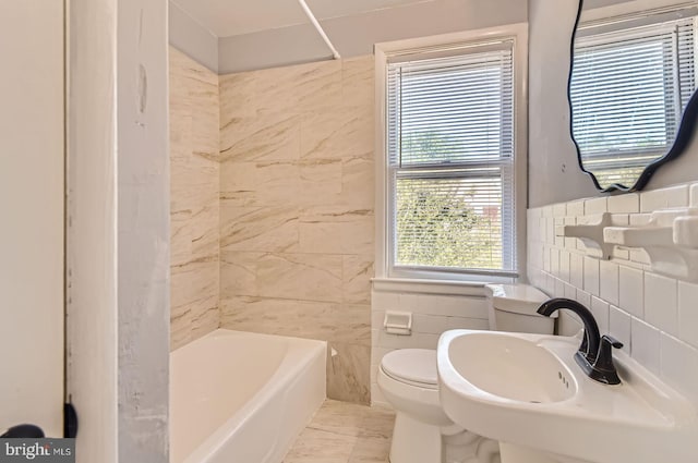 3401 Woodring Ave, Baltimore, MD 21234 - full bathroom featuring tile walls and bathing tub / shower combination