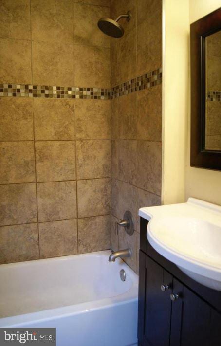 2803 Berwick Ave, Baltimore, MD 21234 - full bathroom featuring vanity and shower / bath combination