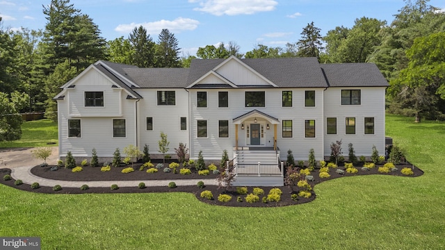 387 Gallup Rd, Princeton, NJ 08540 - view of front of property featuring board and batten siding, a front yard, and view of scattered trees