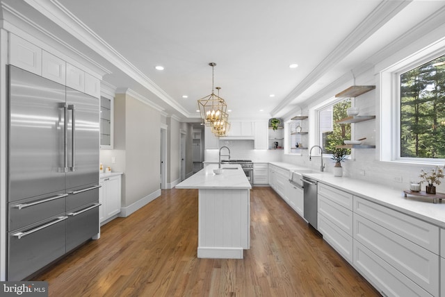 387 Gallup Rd, Princeton, NJ 08540 - kitchen with appliances with stainless steel finishes, open shelves, backsplash, a chandelier, and white cabinets