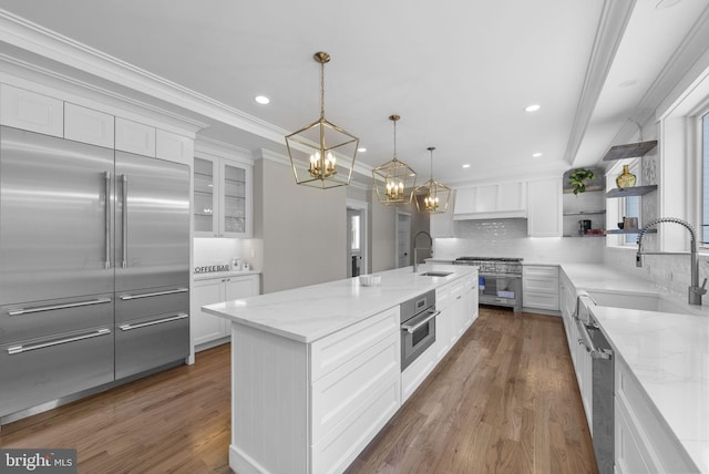387 Gallup Rd, Princeton, NJ 08540 - kitchen with a chandelier, tasteful backsplash, open shelves, light stone counters, and white cabinets