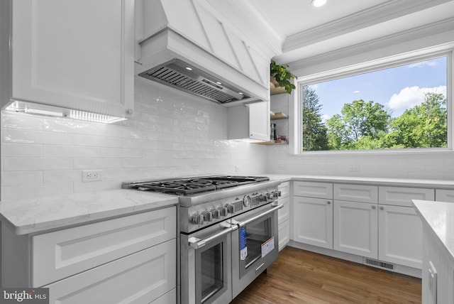 387 Gallup Rd, Princeton, NJ 08540 - kitchen with range with two ovens, custom range hood, white cabinetry, backsplash, and ornamental molding