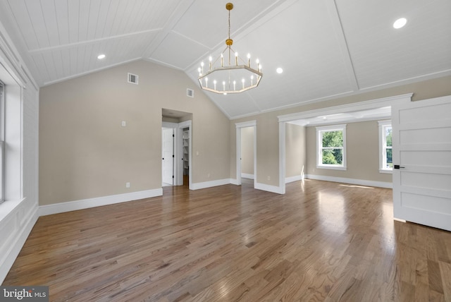 387 Gallup Rd, Princeton, NJ 08540 - unfurnished living room with vaulted ceiling, a chandelier, wood finished floors, and recessed lighting