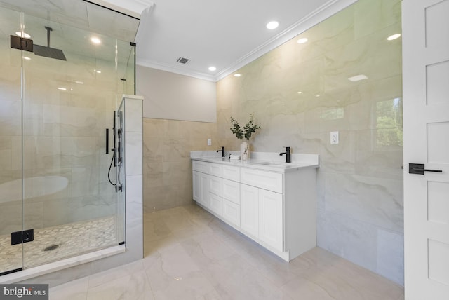 387 Gallup Rd, Princeton, NJ 08540 - bathroom with tile walls, ornamental molding, a stall shower, marble finish floors, and double vanity