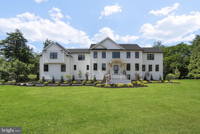 387 Gallup Rd, Princeton, NJ 08540 - view of front of home featuring board and batten siding and a front yard