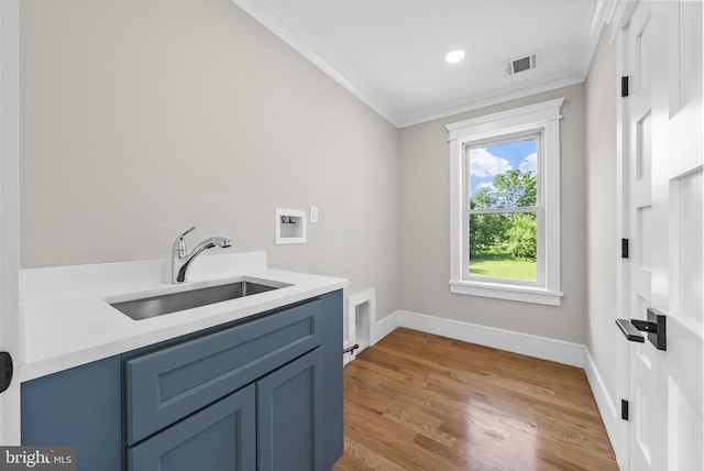 387 Gallup Rd, Princeton, NJ 08540 - laundry area with crown molding, washer hookup, cabinet space, light wood-style floors, and recessed lighting