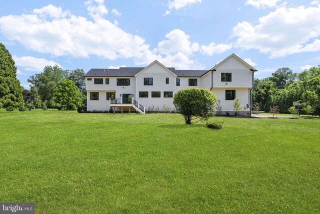 387 Gallup Rd, Princeton, NJ 08540 - rear view of house featuring board and batten siding and a lawn