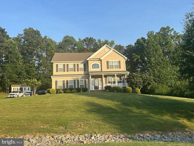 39929 Grandview Haven Dr, Mechanicsville, MD 20659 - colonial home featuring covered porch and a front lawn
