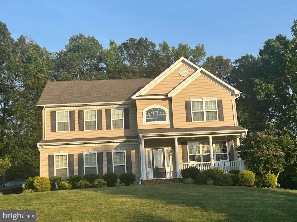 39929 Grandview Haven Dr, Mechanicsville, MD 20659 - view of front of property with a porch and a front yard