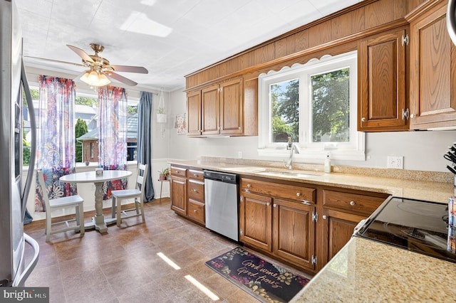 15 Overlook Ave, Lancaster, PA 17601 - kitchen featuring stainless steel appliances, a ceiling fan, and brown cabinetry
